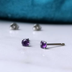 real amethyst claw studs titanium