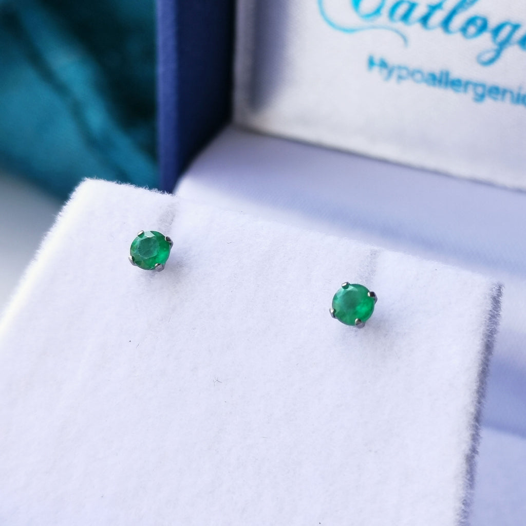 Titnaium emerald earrings to buy online uk