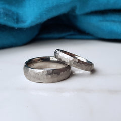 Faceted titanium wedding band