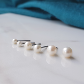 Pearl titanium earrings. allergy free pearl titanium stud earrings