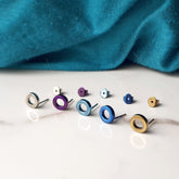 titanium stud earrings with titanium backings. Anodised titanium colours