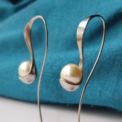 Modern deign Titanium earrings, southsea pearls