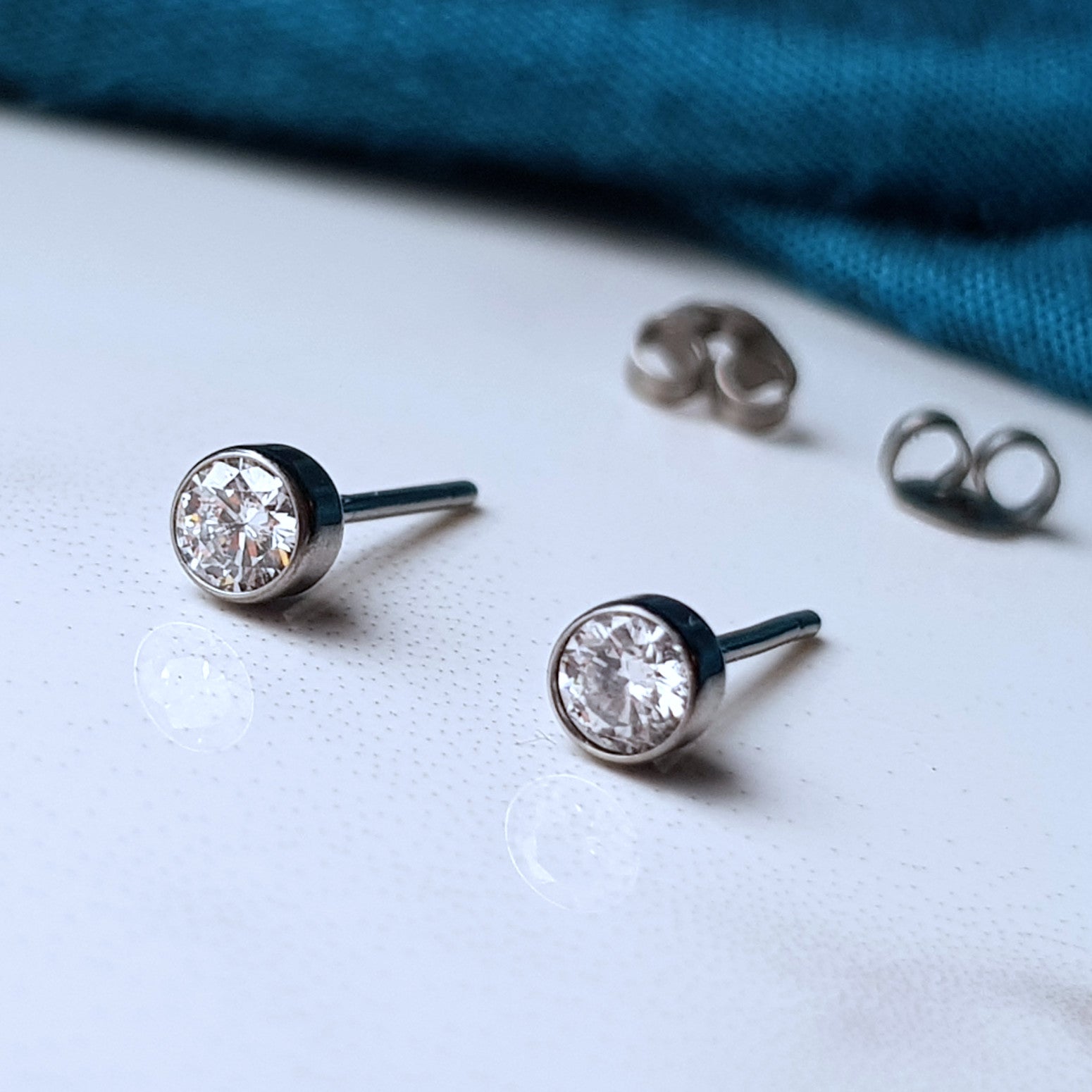Titanium diamond studs clearance