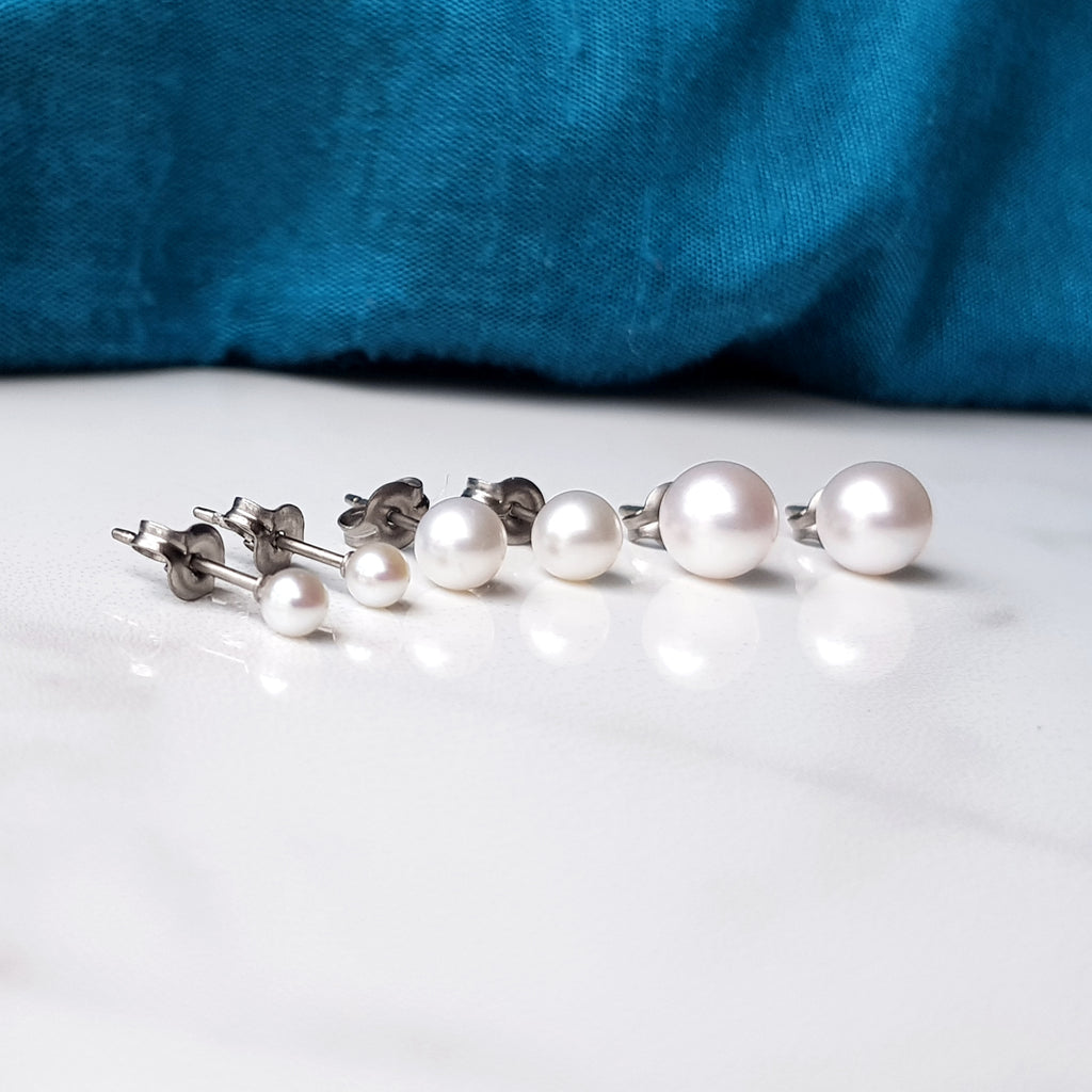 pearl earrings on hypoallergenic pure titanium